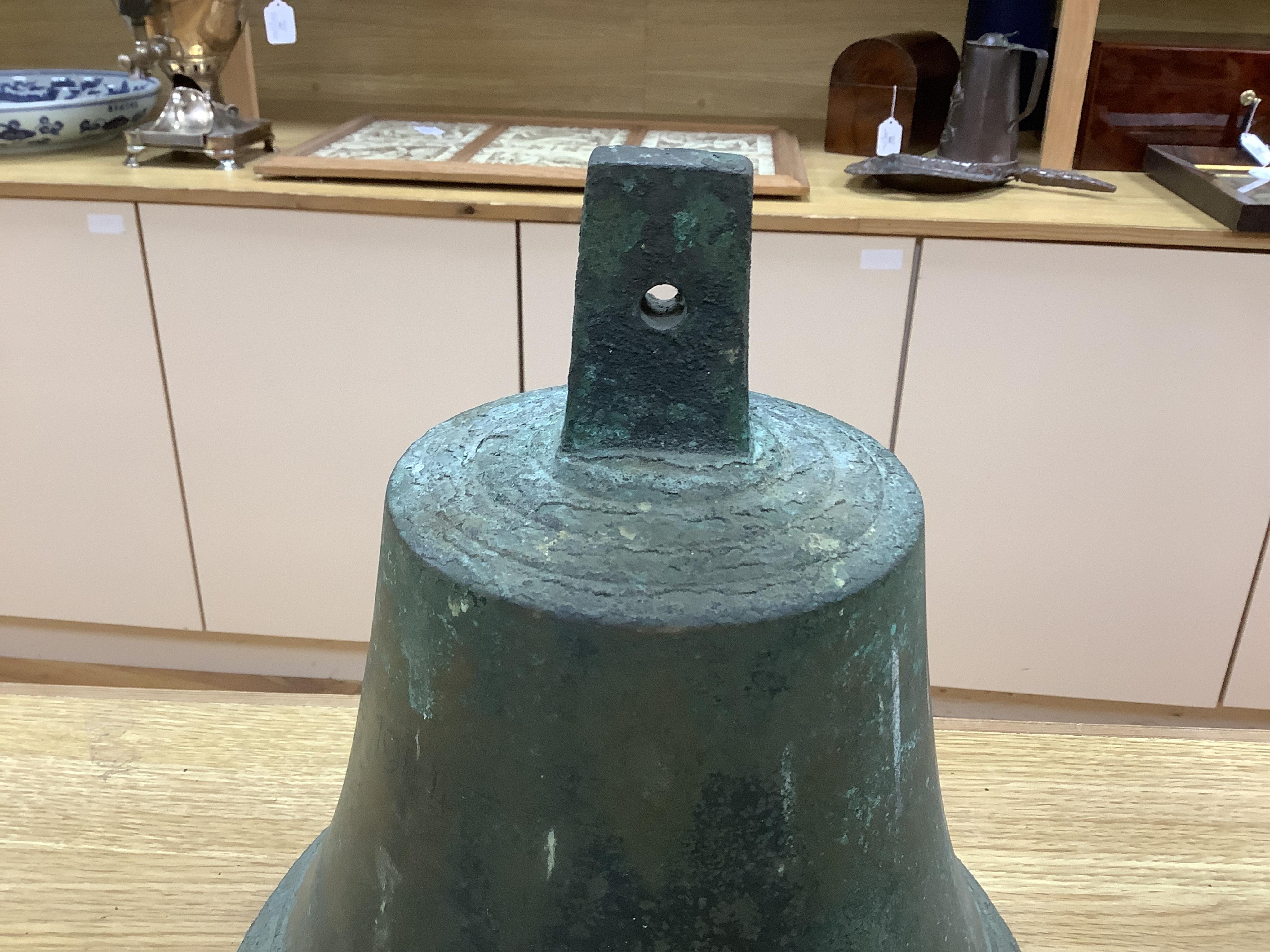 A ship’s bell, marked ‘J D A Jung 1944’, 28cm maximum height
